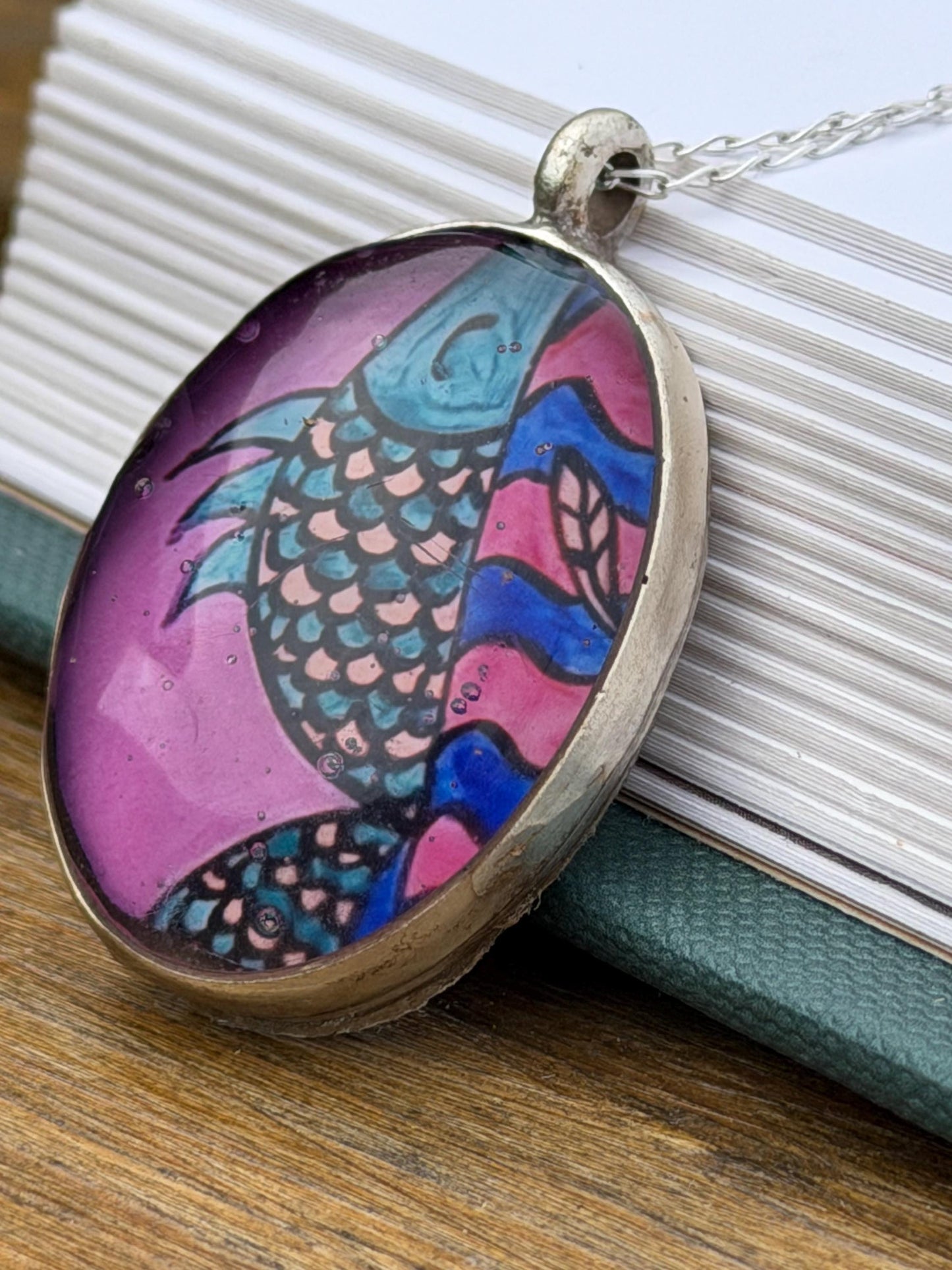 Bright joyful necklaces made with my own photos & recycled sterling silver. Eco friendly jewellery. Boho colourful pendants. Bright pink.