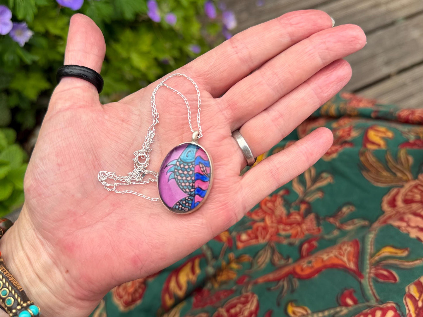 Bright joyful necklaces made with my own photos & recycled sterling silver. Eco friendly jewellery. Boho colourful pendants. Bright pink.