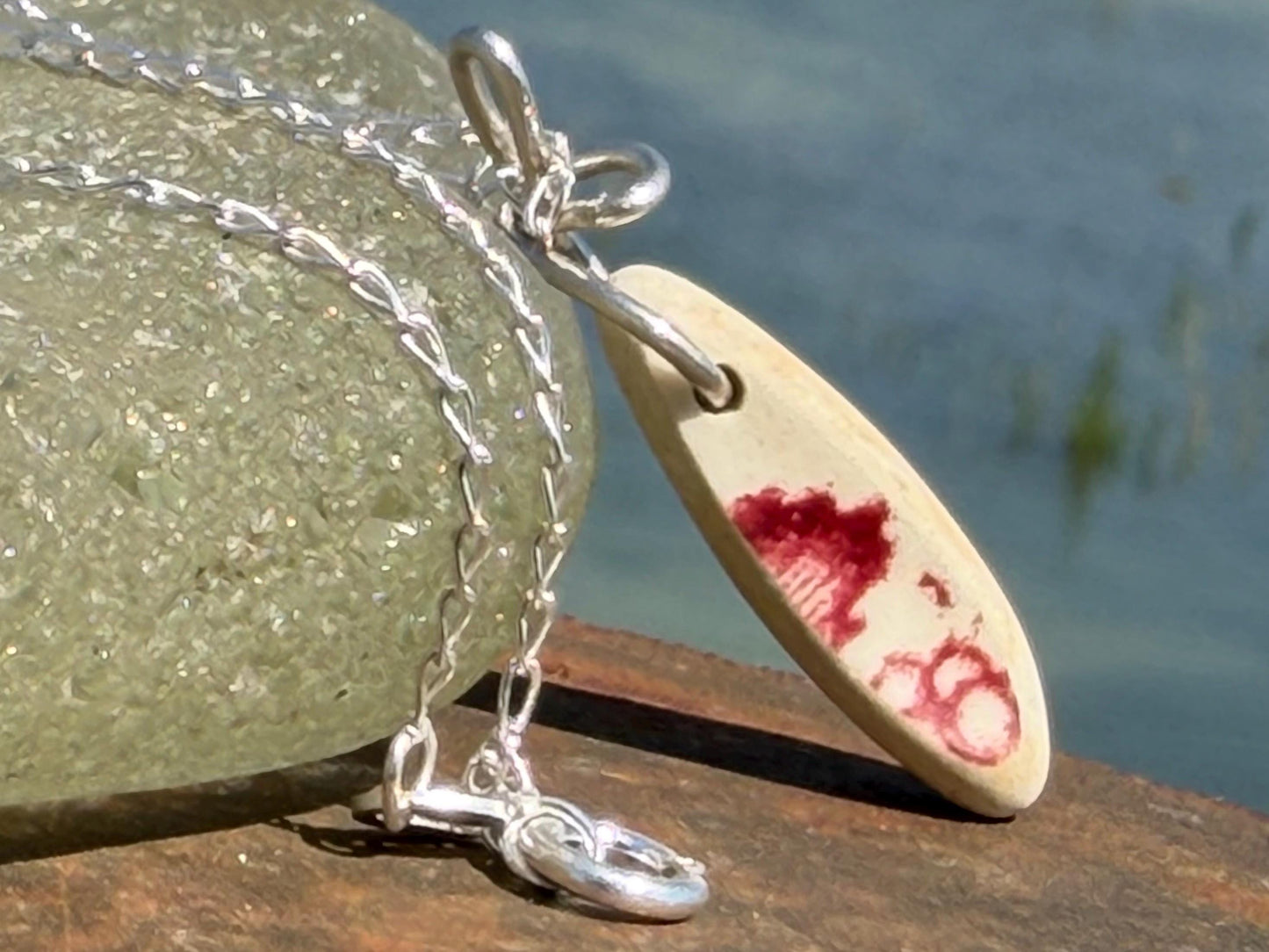 Eco friendly sea ceramic necklace on a sterling silver chain. Eco friendly jewellery, ethical jewellery. Eco friendly necklace.