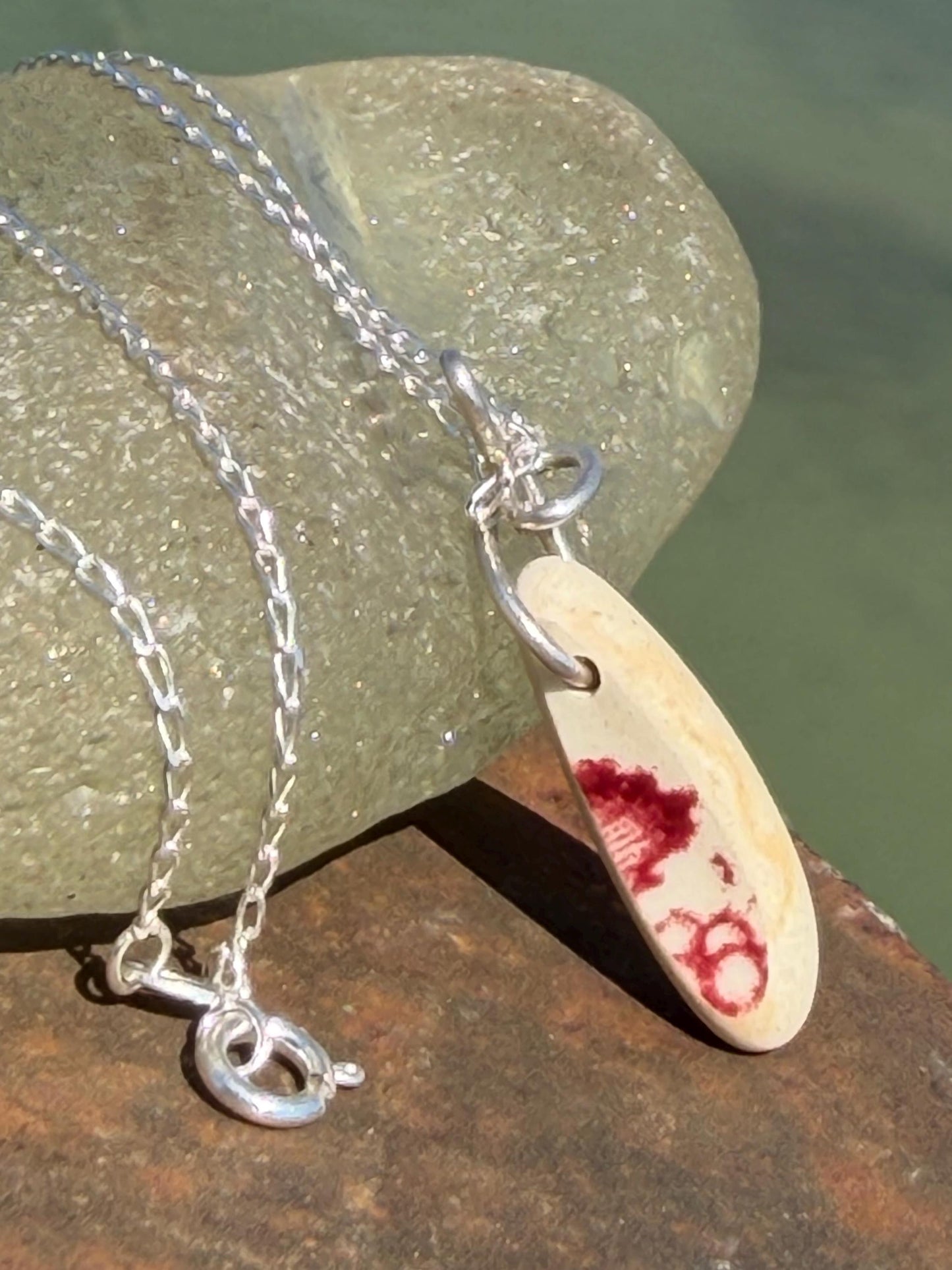 Eco friendly sea ceramic necklace on a sterling silver chain. Eco friendly jewellery, ethical jewellery. Eco friendly necklace.