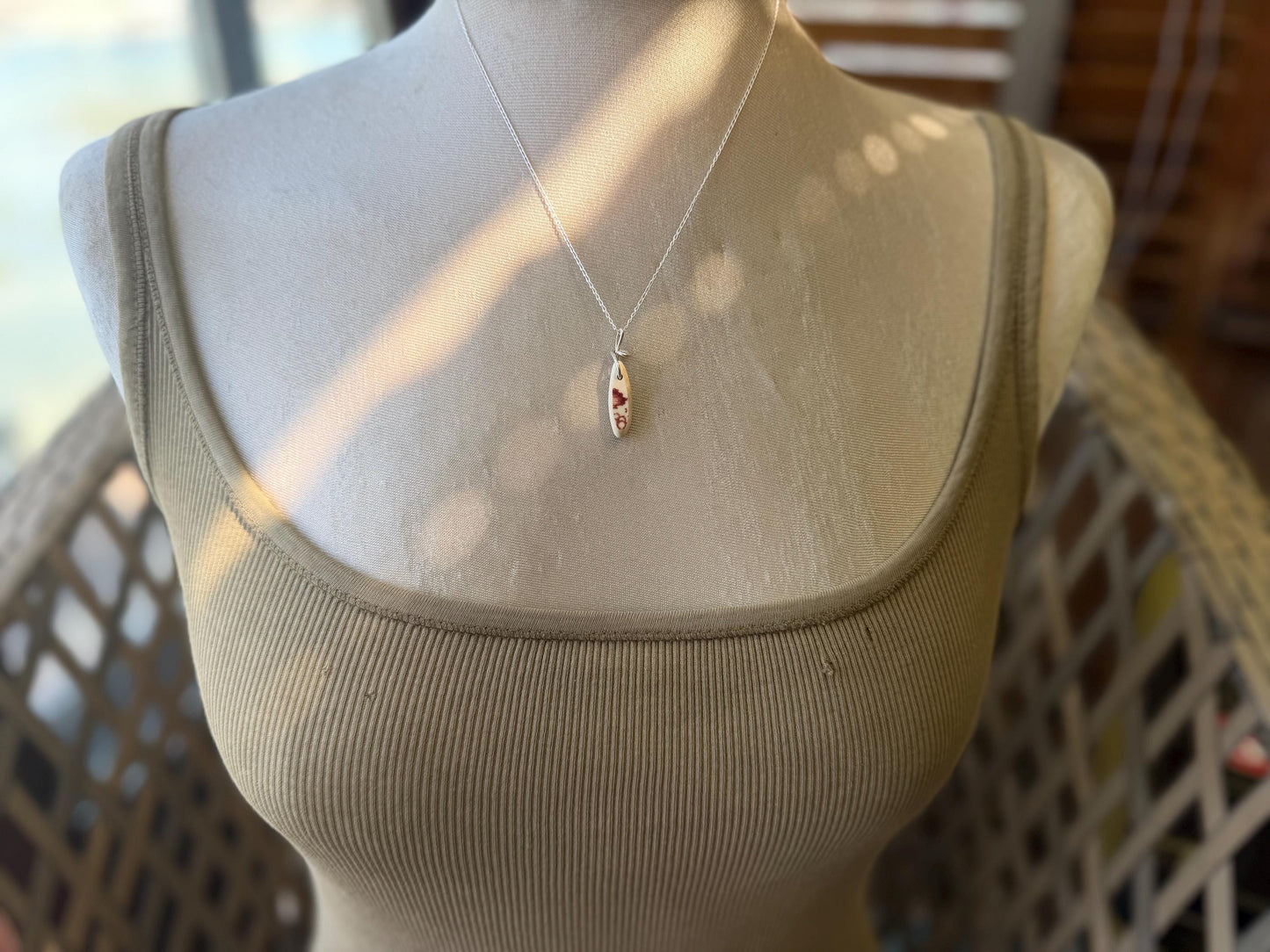 Eco friendly sea ceramic necklace on a sterling silver chain. Eco friendly jewellery, ethical jewellery. Eco friendly necklace.