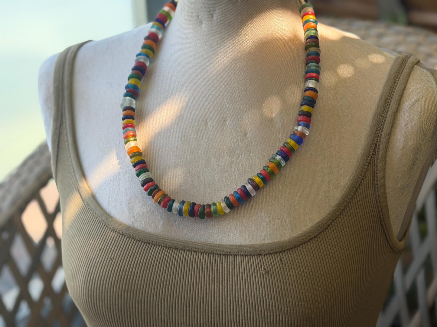 Eco friendly necklace made from recycled glass and hung in raffia. Ethical jewellery that doesnt cost the earth! Sustainable, eco gifts