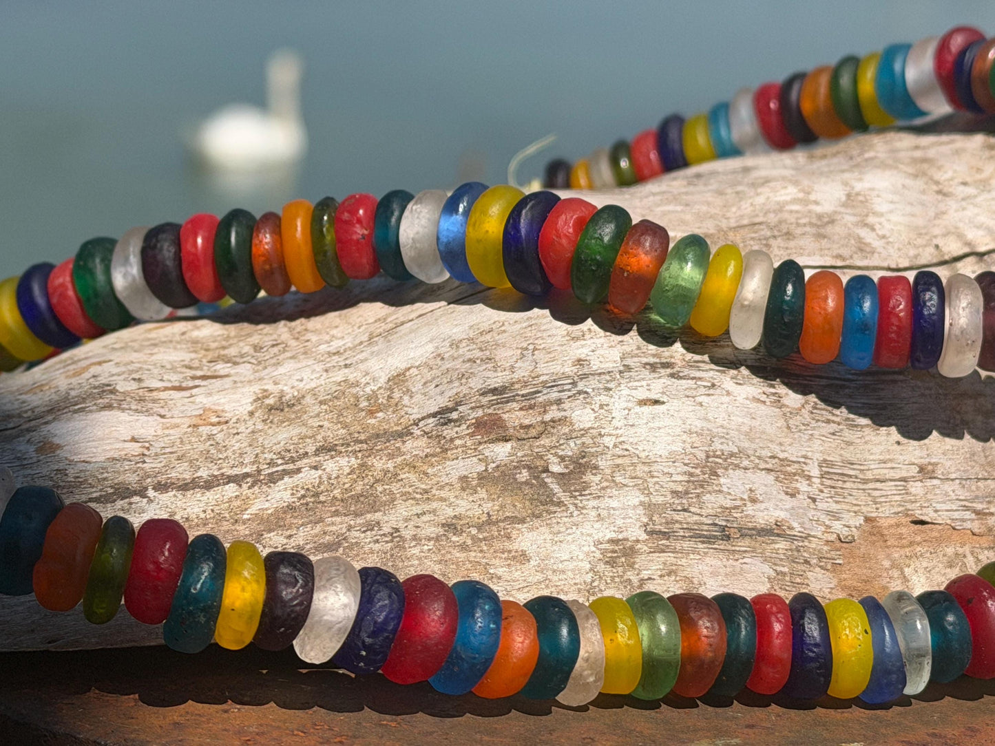 Eco friendly necklace made from recycled glass and hung in raffia. Ethical jewellery that doesnt cost the earth! Sustainable, eco gifts