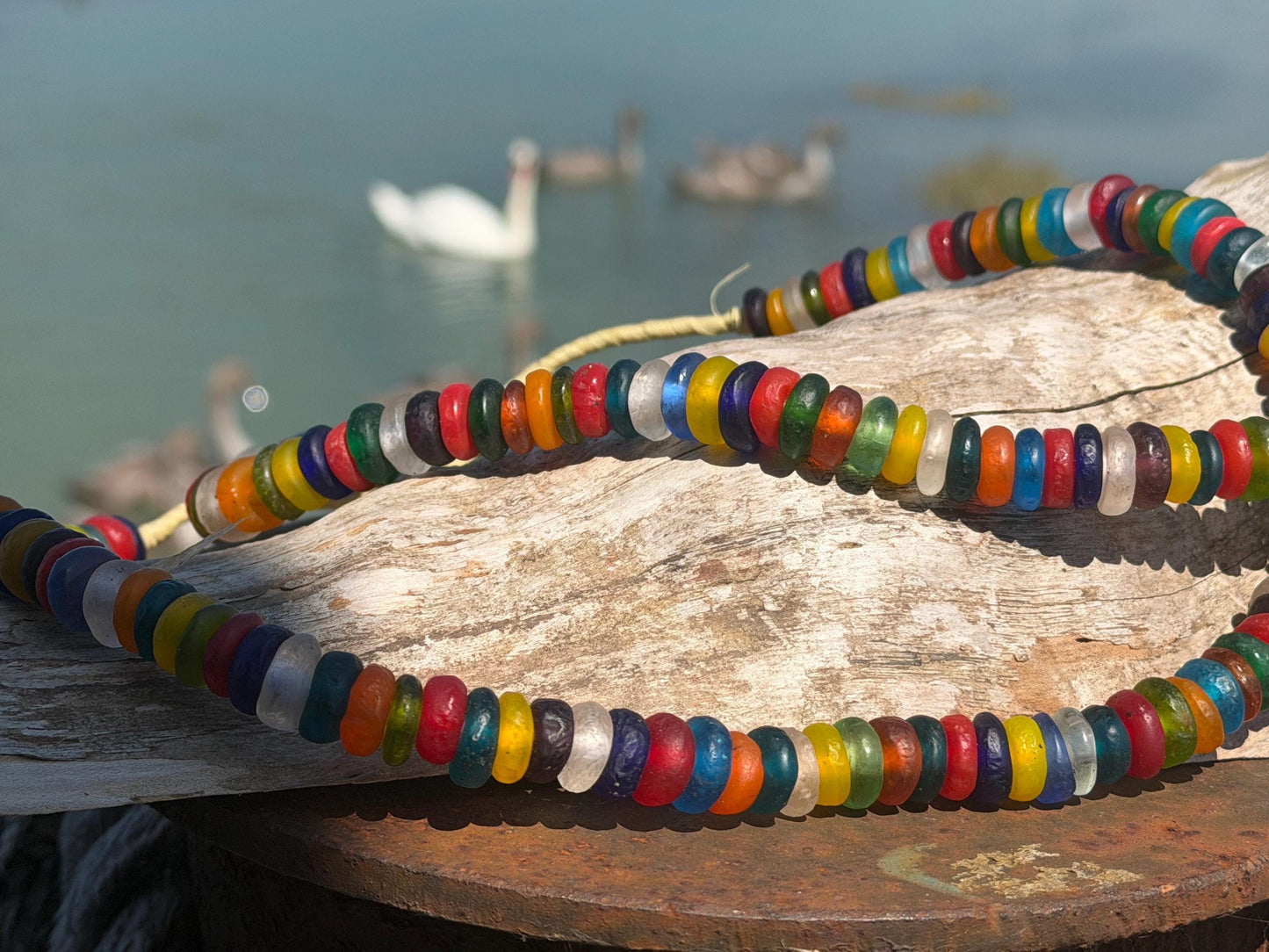 Eco friendly necklace made from recycled glass and hung in raffia. Ethical jewellery that doesnt cost the earth! Sustainable, eco gifts
