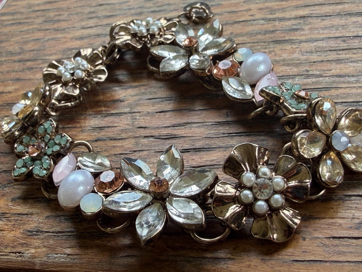 Very pretty vintage bangle filled with flowers. Stunning in the light. Eco friendly vintage jewellery. Boho ethical jewellery.