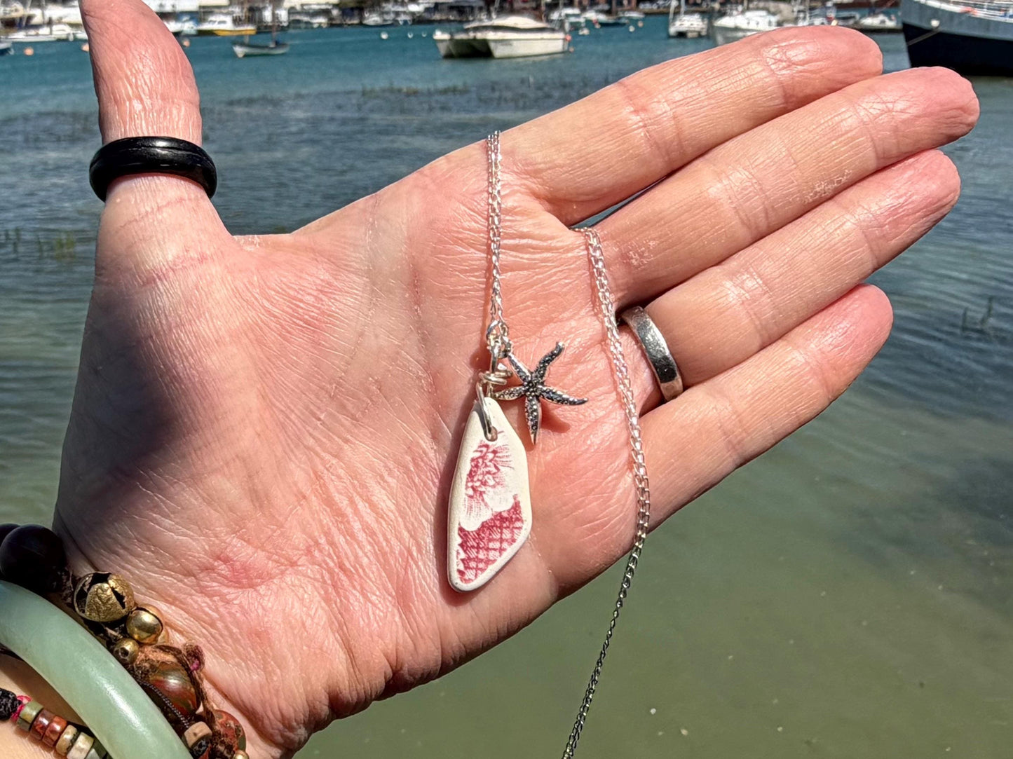 Eco friendly sea ceramic necklace on a sterling silver chain. Eco friendly jewellery, ethical jewellery. Eco friendly necklace.