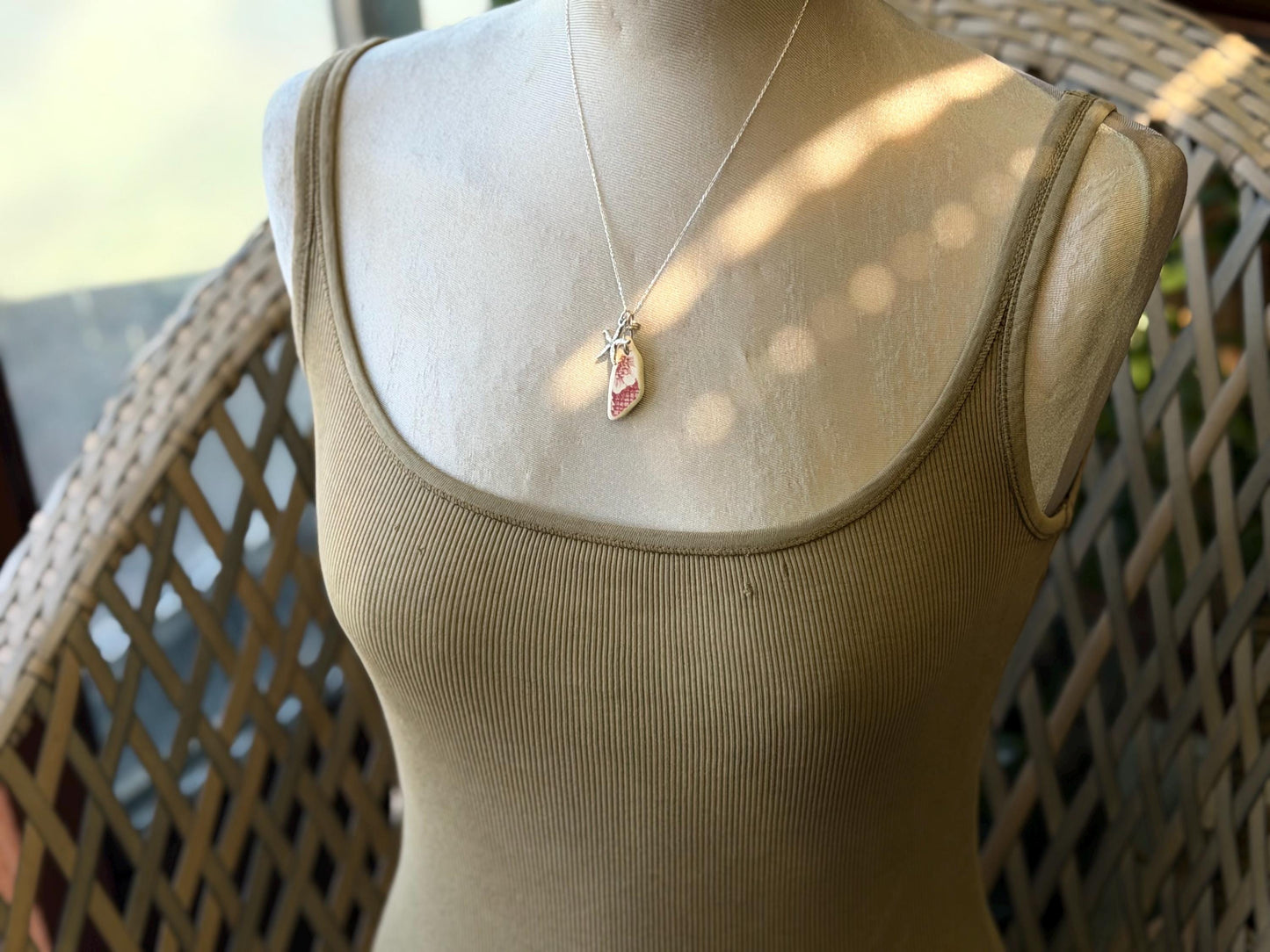 Eco friendly sea ceramic necklace on a sterling silver chain. Eco friendly jewellery, ethical jewellery. Eco friendly necklace.