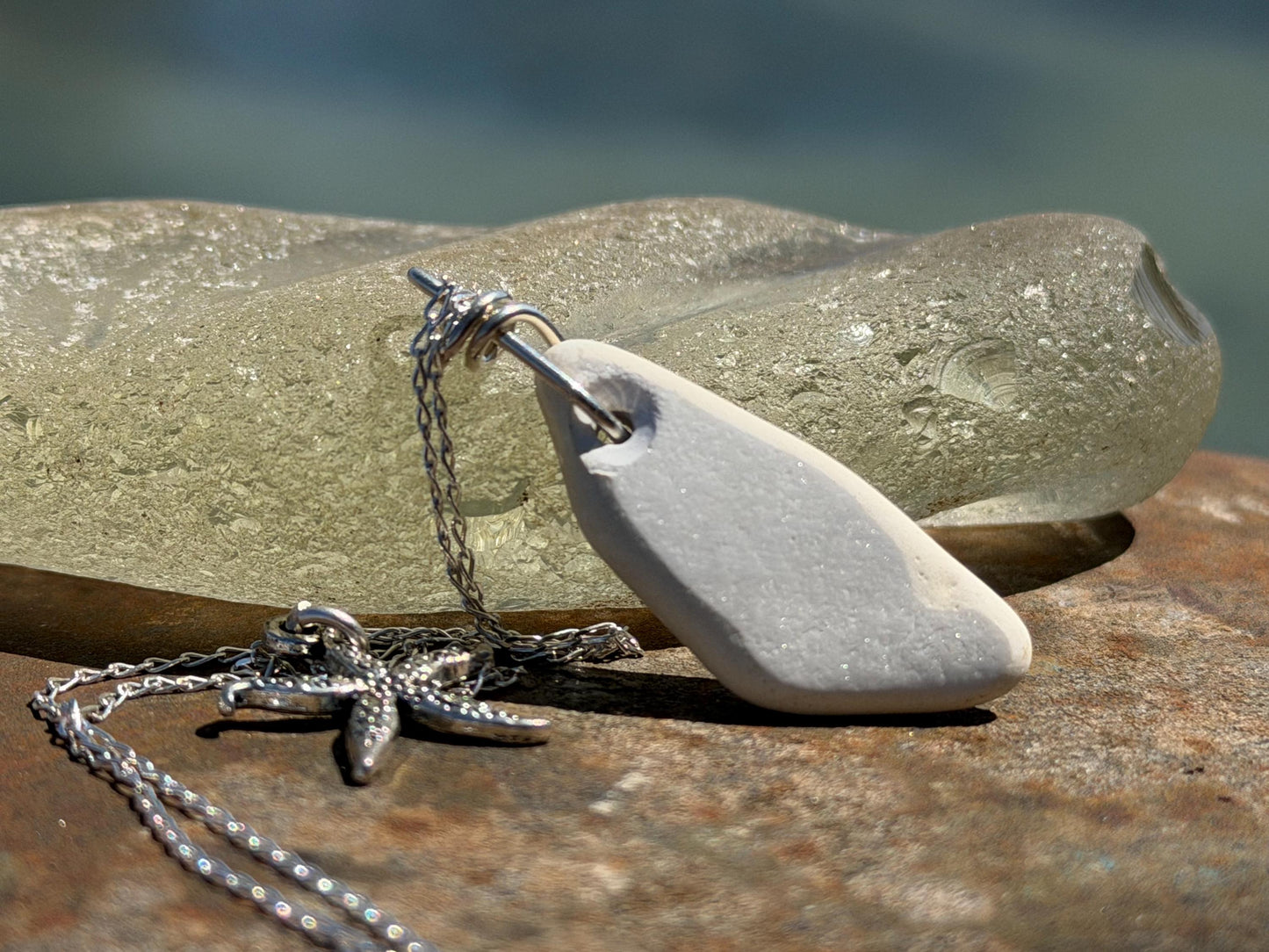 Eco friendly sea ceramic necklace on a sterling silver chain. Eco friendly jewellery, ethical jewellery. Eco friendly necklace.
