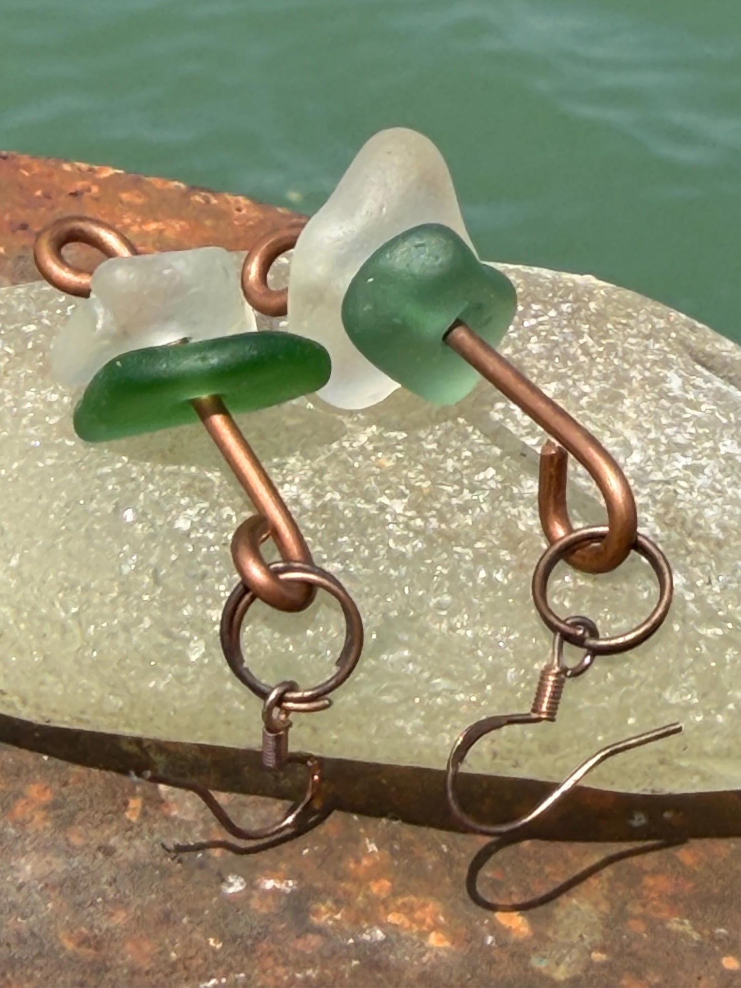 Handmade green & white sea glass on recycled copper. Unique earrings, ethical jewellery, unusual jewellery, eco friendly jewellery.