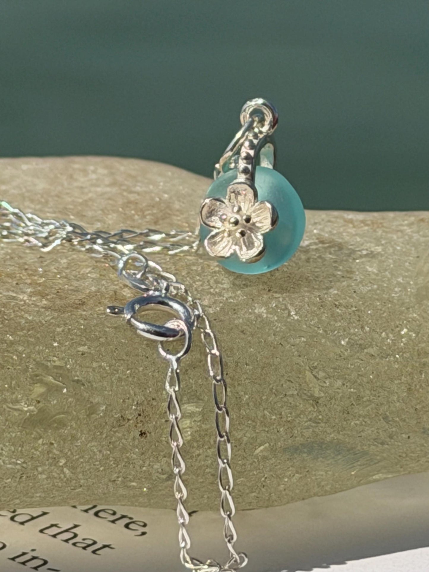 Dainty little sea glass necklace within sterling silver flowers. Recycled necklace. Ethical jewellery. Sea glass pendant. Eco friendly gifts