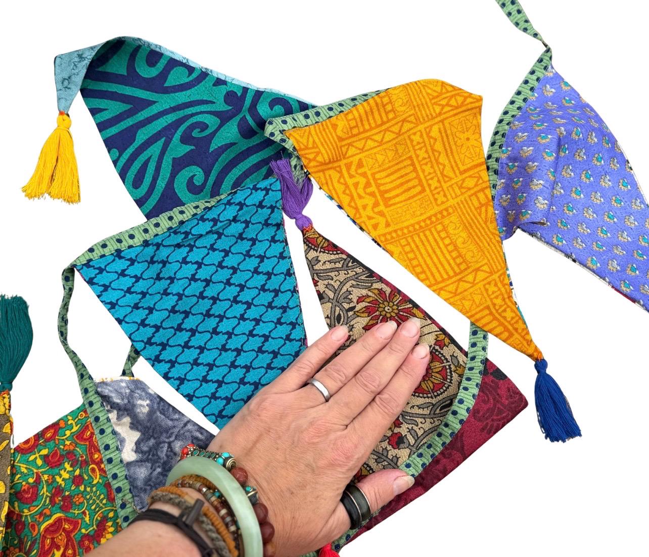 Recycled bunting with long ties and tassels. Boho bunting for home, garden and parties. Party flags with tassels.  Colourful  & eco friendly