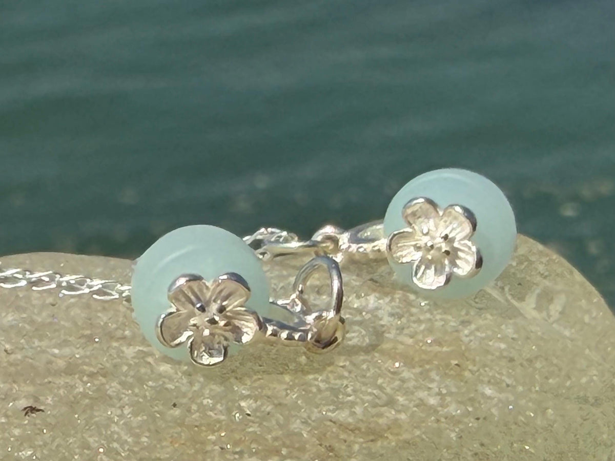 Dainty little recycled glass necklace within sterling silver flower. Recycled necklace. Ethical jewellery. glass pendant. Eco friendly gifts