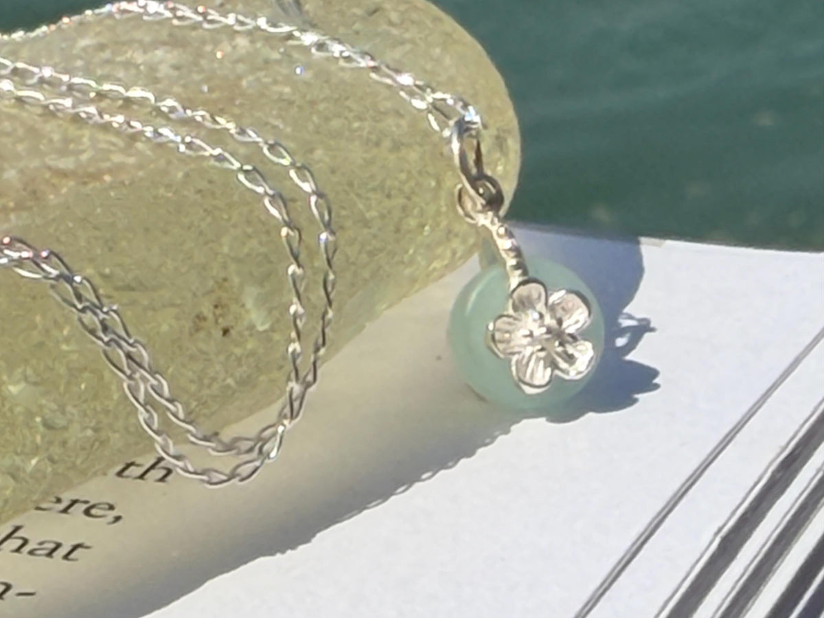 Dainty little recycled glass necklace within sterling silver flower. Recycled necklace. Ethical jewellery. glass pendant. Eco friendly gifts