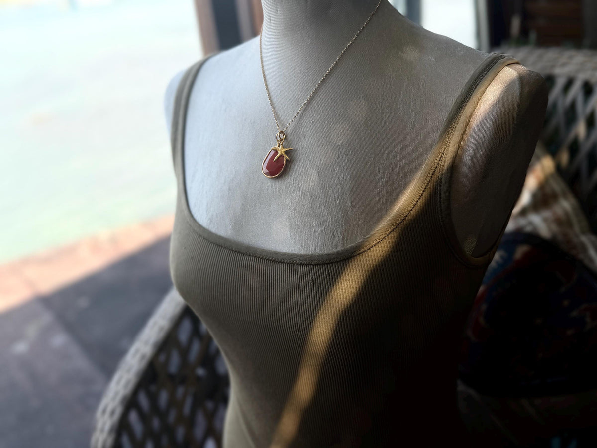 Stunning orange necklace on a recycled adjustable chain. Unusual and beautiful jewellery. Ethical, sustainable and eco friendly. Upcycled.