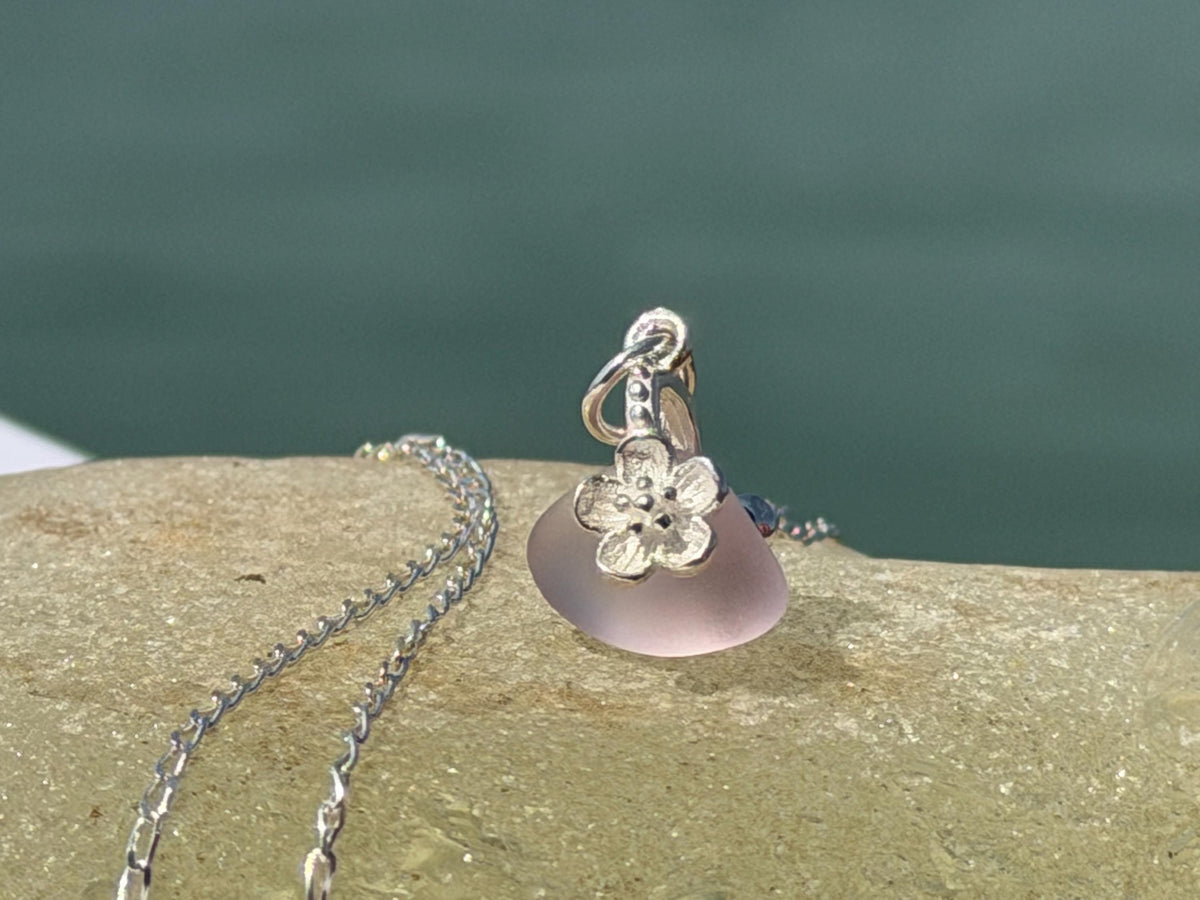Dainty little recycled glass necklace within sterling silver flower. Recycled necklace. Ethical jewellery. glass pendant. Eco friendly gifts