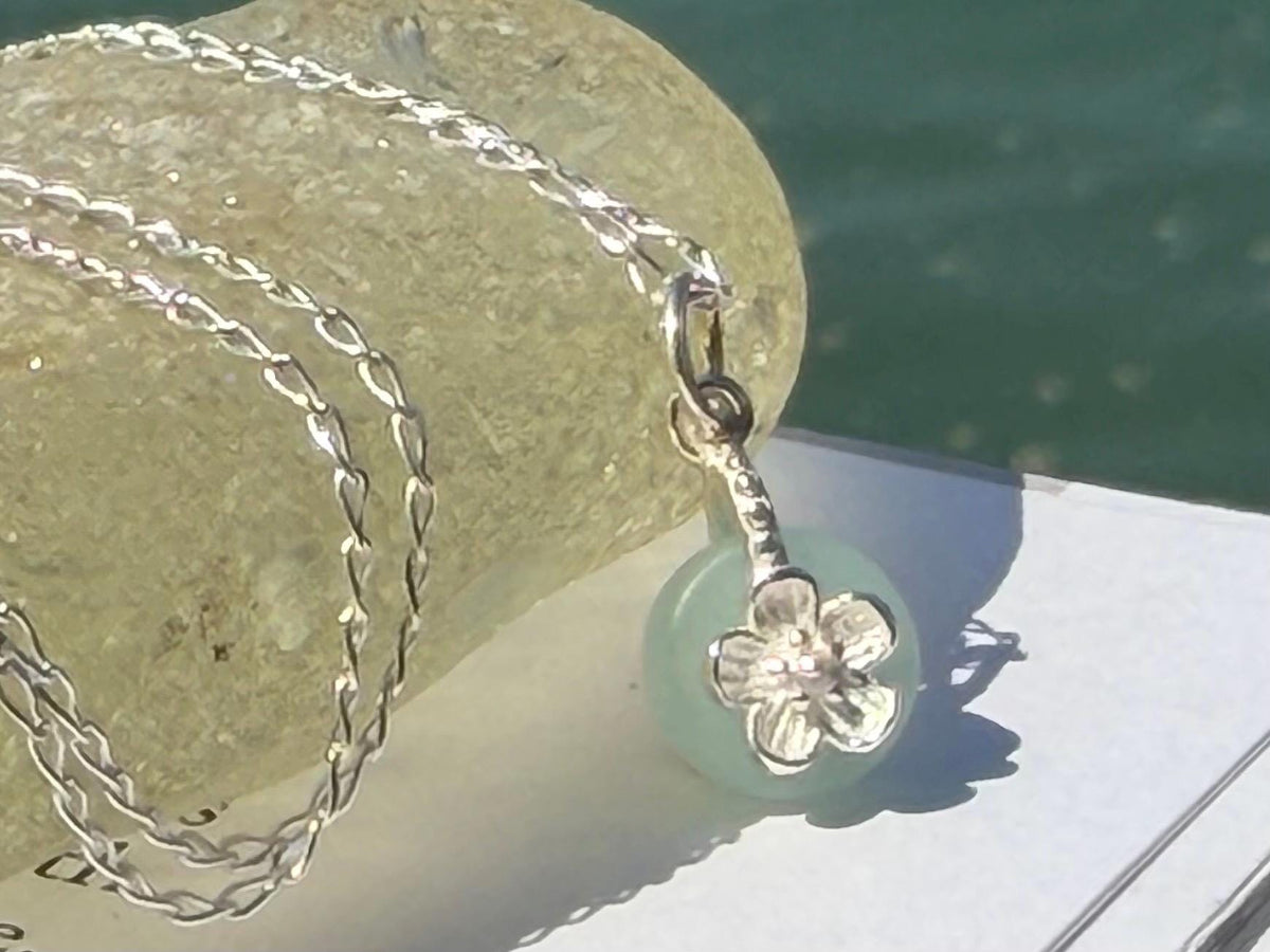 Dainty little recycled glass necklace within sterling silver flower. Recycled necklace. Ethical jewellery. glass pendant. Eco friendly gifts