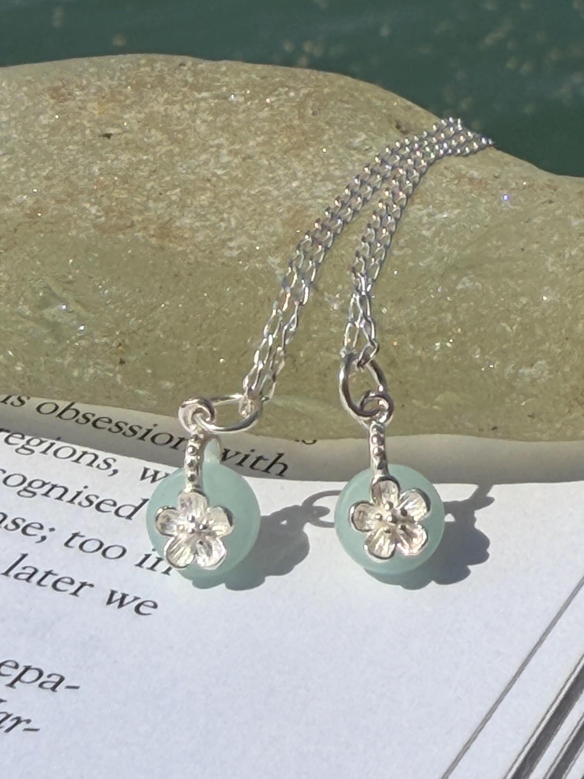 Dainty little recycled glass necklace within sterling silver flower. Recycled necklace. Ethical jewellery. glass pendant. Eco friendly gifts