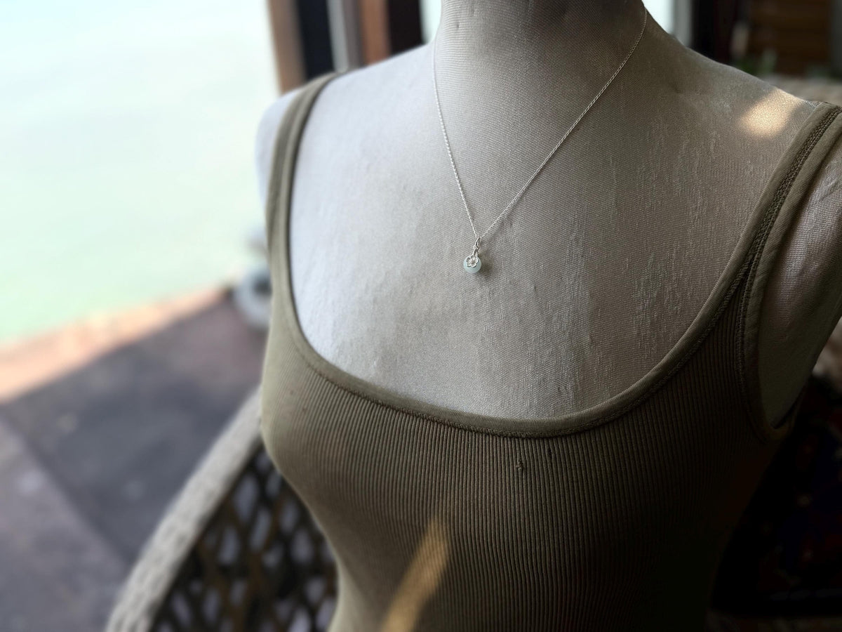 Dainty little recycled glass necklace within sterling silver flower. Recycled necklace. Ethical jewellery. glass pendant. Eco friendly gifts