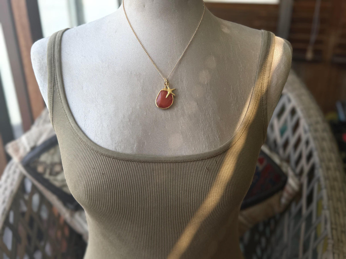 Stunning orange necklace on a recycled adjustable chain. Unusual and beautiful jewellery. Ethical, sustainable and eco friendly. Upcycled.