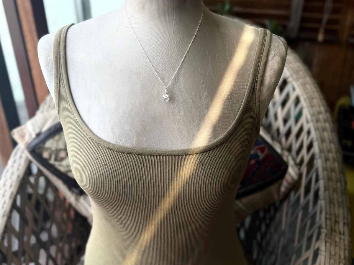 Dainty little recycled glass necklace within sterling silver flower. Recycled necklace. Ethical jewellery. glass pendant. Eco friendly gifts