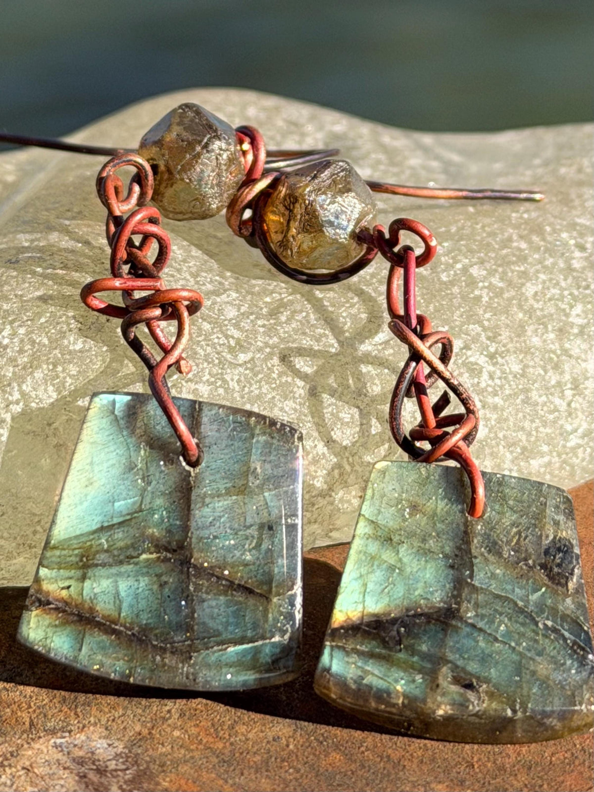 Ethically sourced labradorite earrings held on recycled copper. Ethical eco friendly  jewellery, labradorite jewellery. Boho unique earrings