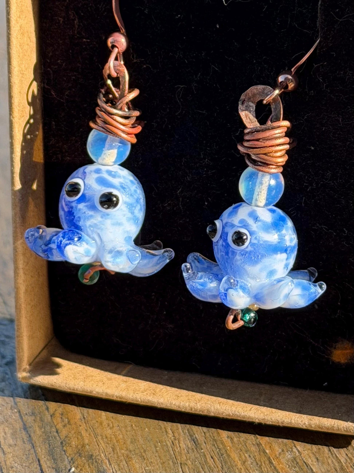Glass octopus earrings made from recycled copper and glass. Octopus jewellery. Handmade earrings. Eco friendly jewellery.