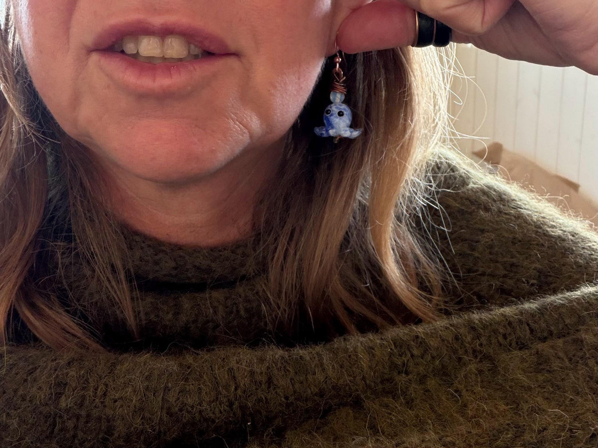 Glass octopus earrings made from recycled copper and glass. Octopus jewellery. Handmade earrings. Eco friendly jewellery.