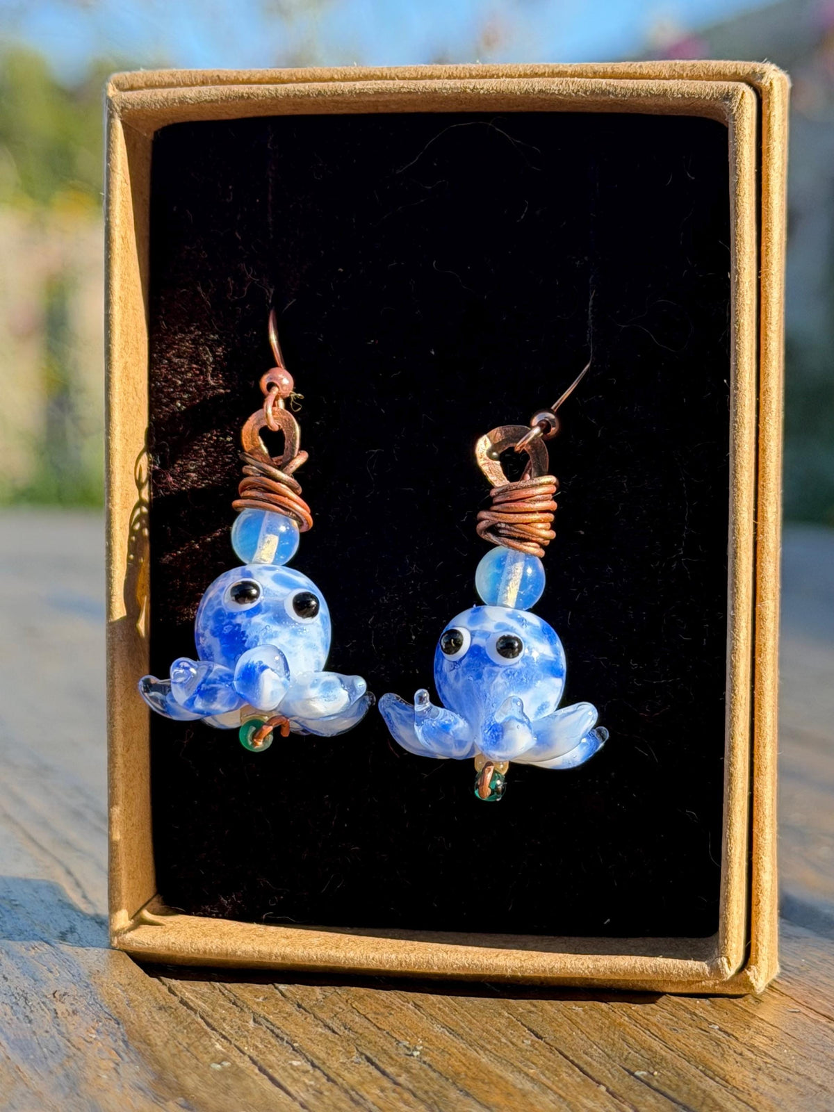 Glass octopus earrings made from recycled copper and glass. Octopus jewellery. Handmade earrings. Eco friendly jewellery.